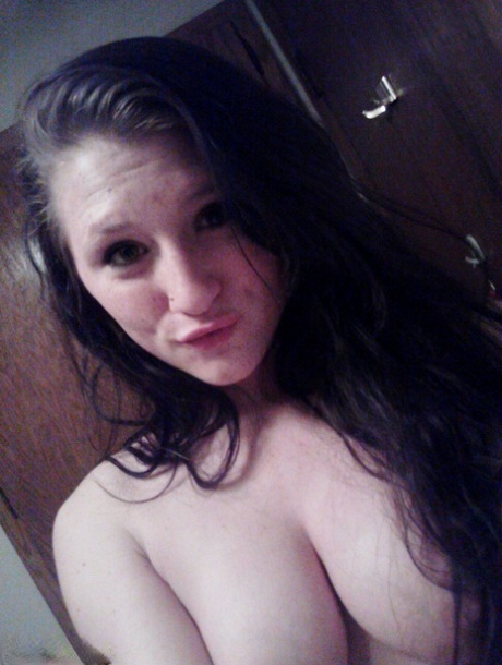 Amateur girl Freckles 18 takes selfies while going topless in cute panties