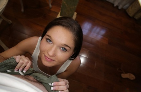 Charming teen with nice eyes Zoe Bloom gives a BJ before getting fucked in POV