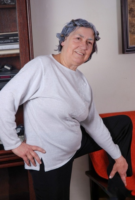 Grey haired granny Margarethe reveals her amazing breasts and plays with a toy
