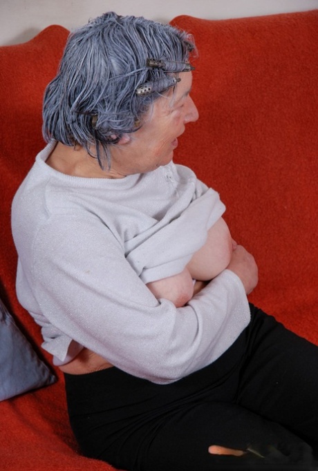 Grey haired granny Margarethe reveals her amazing breasts and plays with a toy